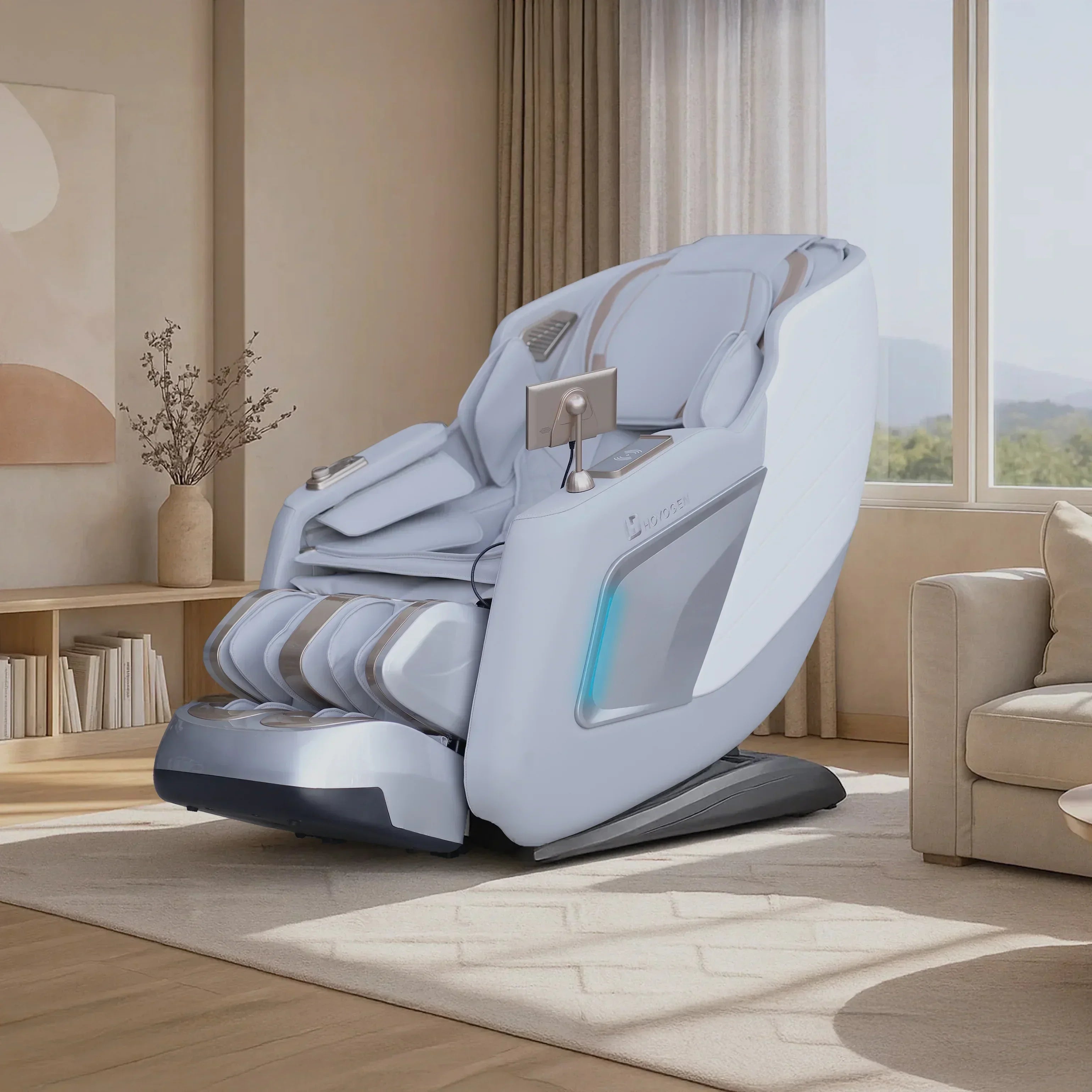 Modern grey massage chair in a bright living room with large window and cozy decor