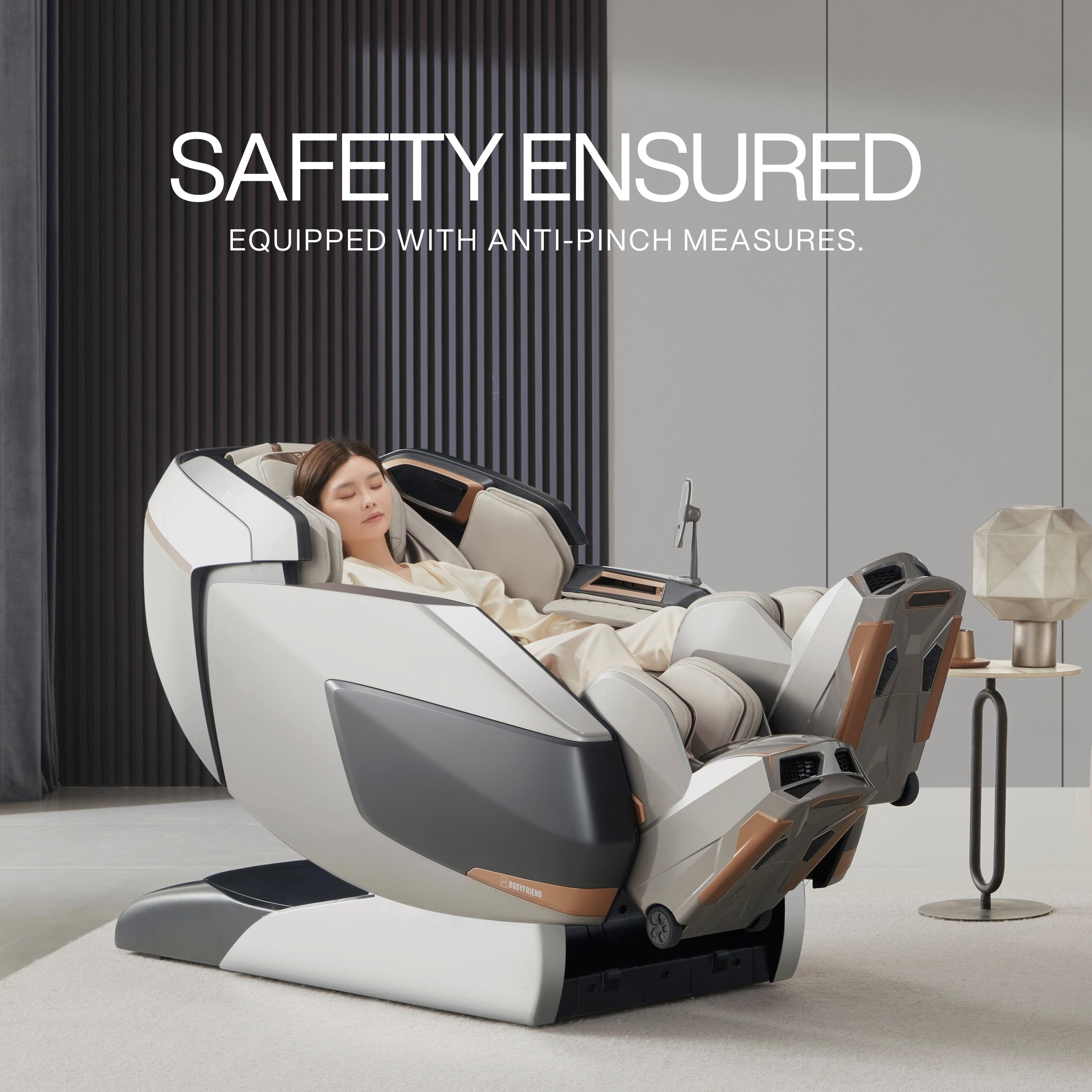 AI robotic massage chair in glacier silver providing a relaxing massage, equipped with anti-pinch safety measures