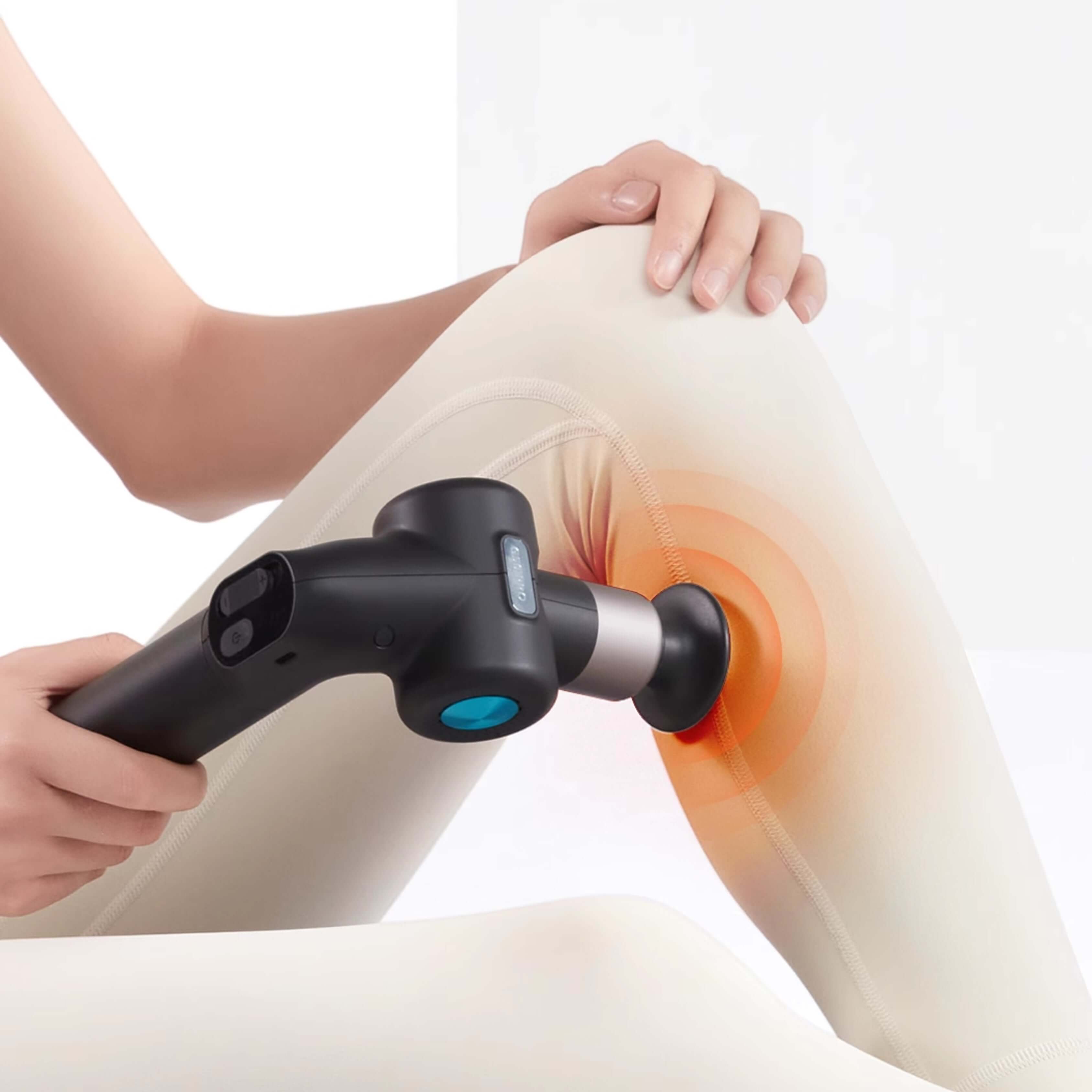 Person using Rotai Muscle Therapy Foldable Massage Gun for leg relief with silica gel massage head