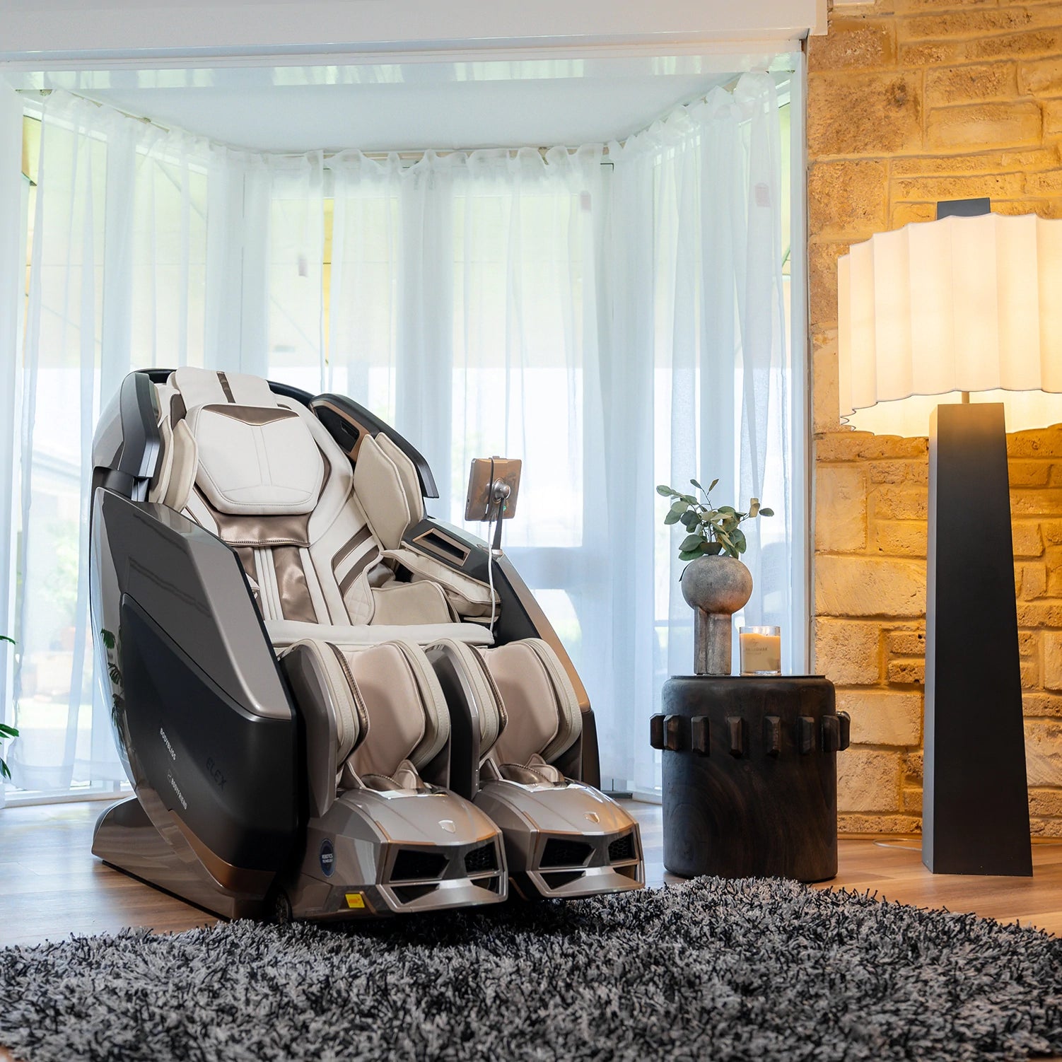 Woman enjoying Rotai AI Robotic Massage Chair (Glacier Silver) Best massage chair brand Dubai, uae, Saudi Arabia, كرسي التدليك