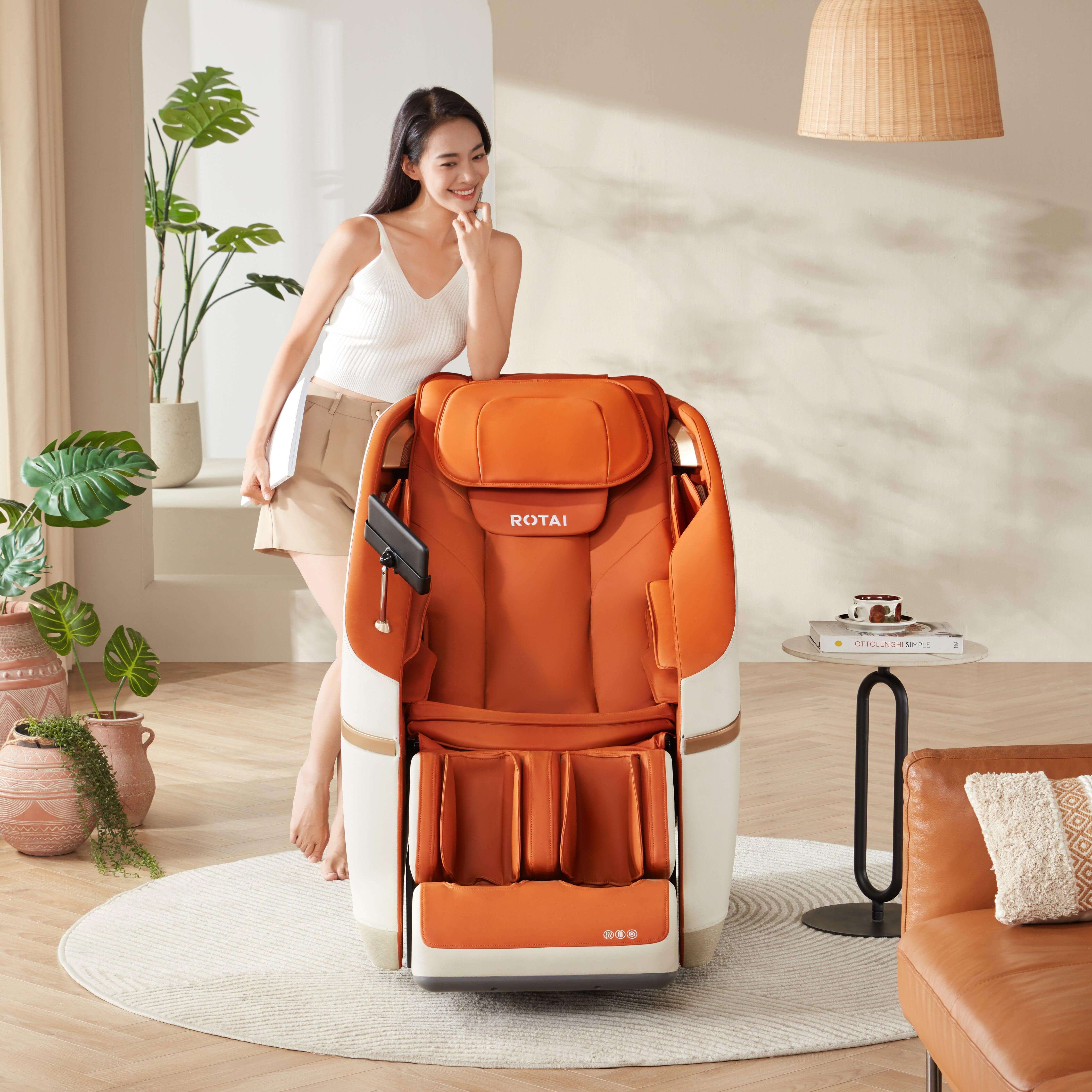 Woman standing next to orange Jimny massage chair with 10-year warranty, available at massage chair shop in Dubai, UAE.best massage chair uae, massage chair Dubai, massage chair uae, massage chair Saudi Arabia, كرسي التدليك, Best Massage Chair In UAE, Dub