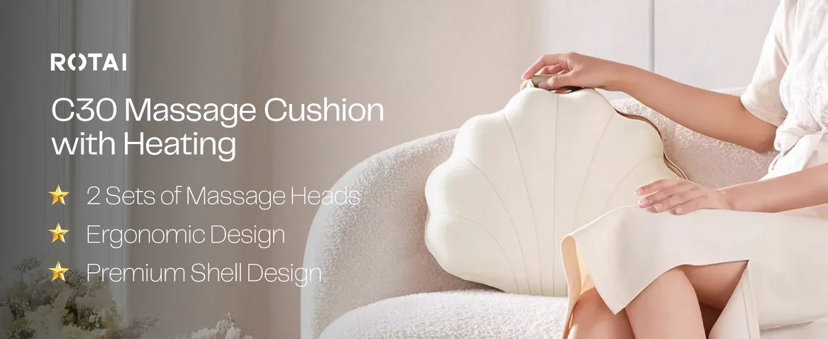 Woman sitting on a sofa with a shell-shaped cream massage cushion featuring ergonomic design.