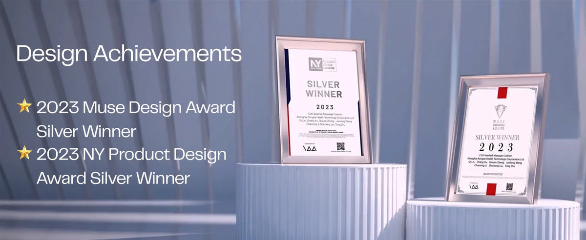 Two framed 2023 silver award certificates for NY Product Design and Muse Design displayed on pedestals.