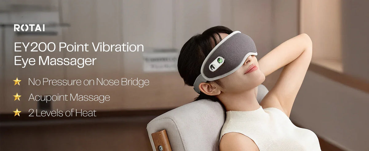 Woman relaxing with a gray EY200 point vibration eye massager, acupoint massage, heat options