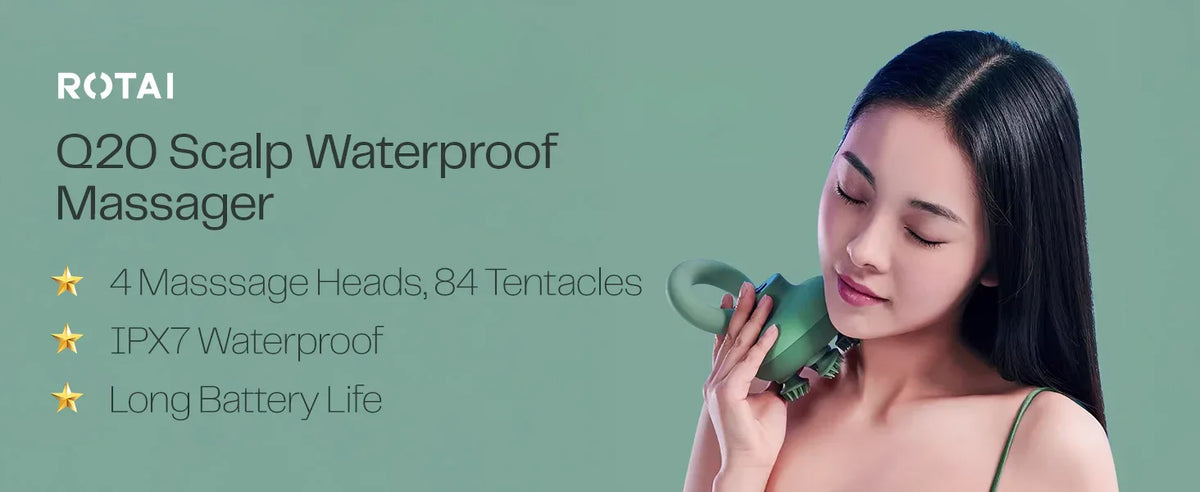 Woman using green waterproof Q20 scalp massager with four massage heads and ergonomic handle